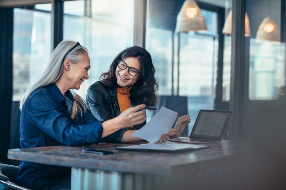 Smiling,Business,Woman,Working,Together,On,Contract,Documents.,Happy,Coworkers